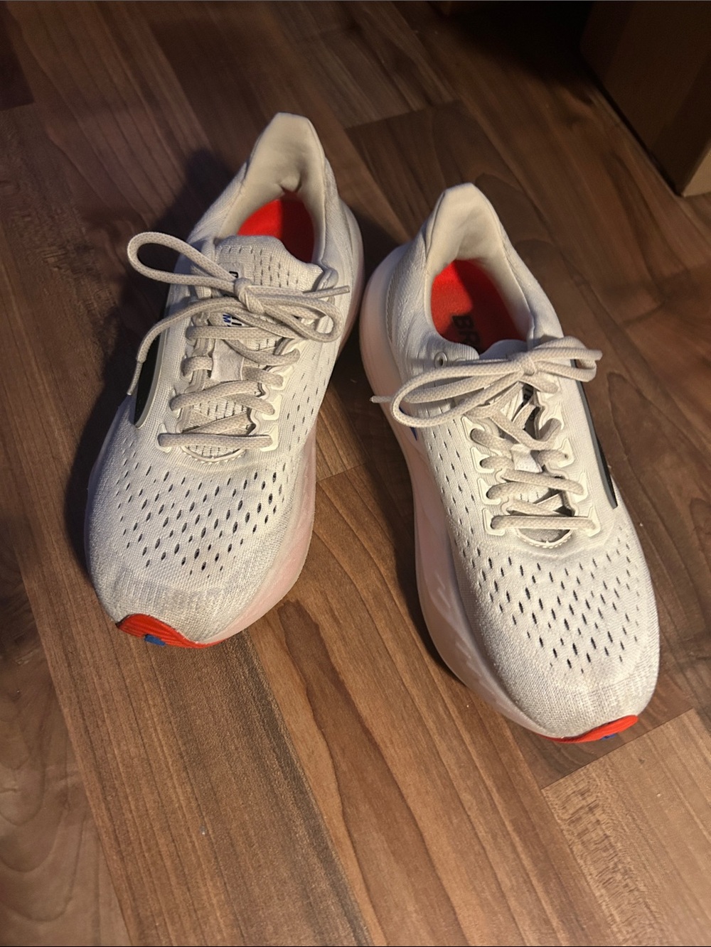 Brooks women’s Lightweight White Running Shoes with Orange Accents